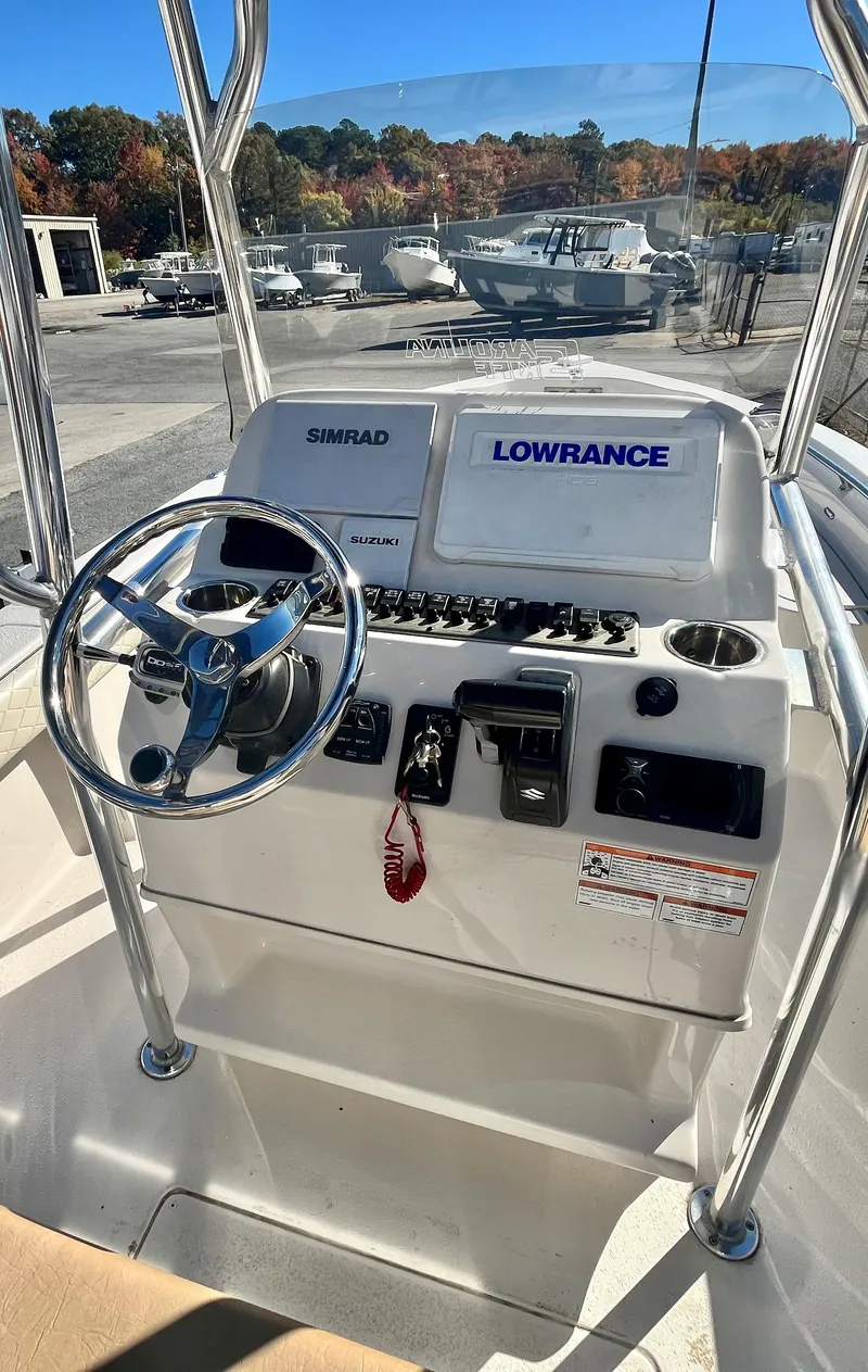 Slide: The Image of 2023 Sea Chaser 23 LX boat console with Simrad and Lowrance electronics. - 11