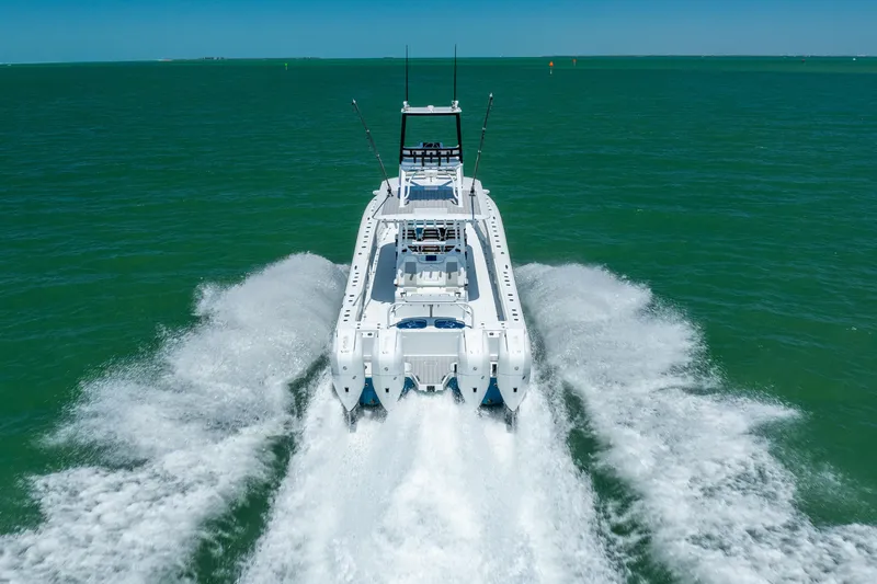 Slide: The Image of Freeman 43 boat cruising on open water, 2023 model, rear view. - 10