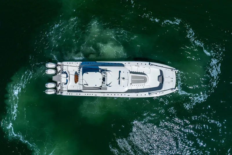 Slide: The Image of Aerial view of 2023 Freeman 43 yacht cruising in green ocean waters. - 15