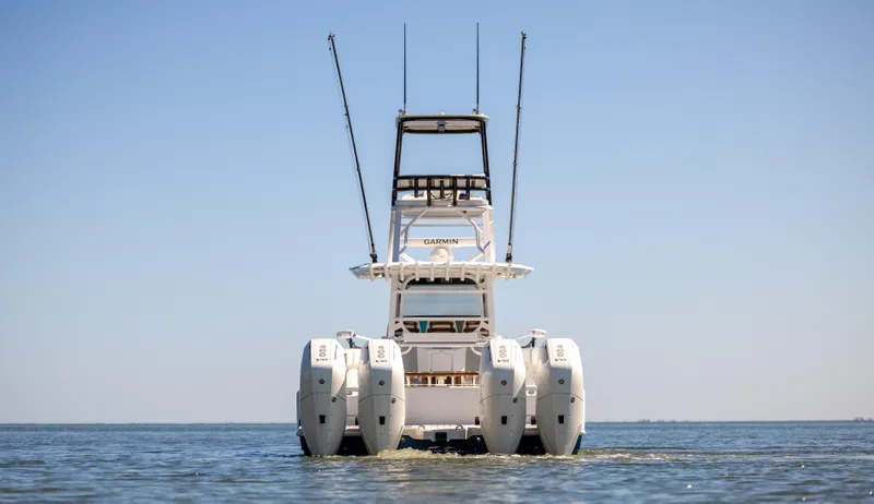 Slide: The Image of Freeman 43 boat with four engines on open water, 2023 model. - 16