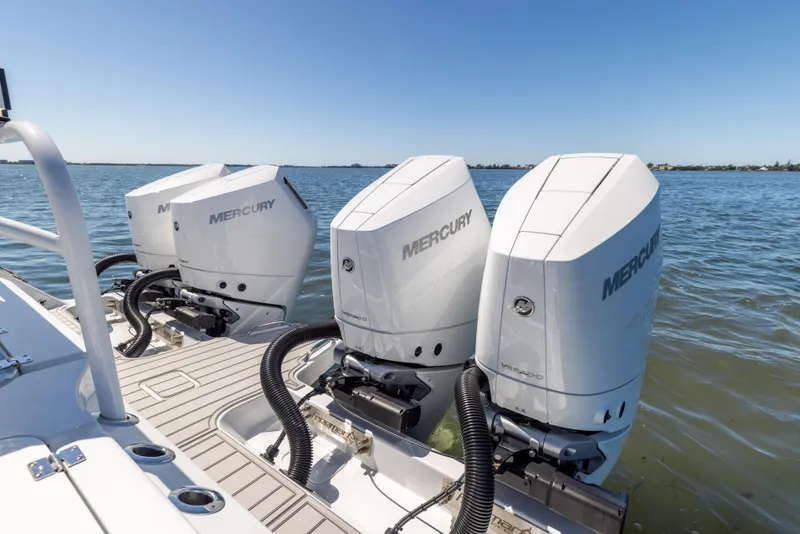 Slide: The Image of Freeman 43 boat with triple Mercury outboard engines on water, 2023 model. - 18