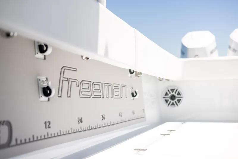 Slide: The Image of Freeman 43 boat interior with measurement markings, 2023 model. - 28