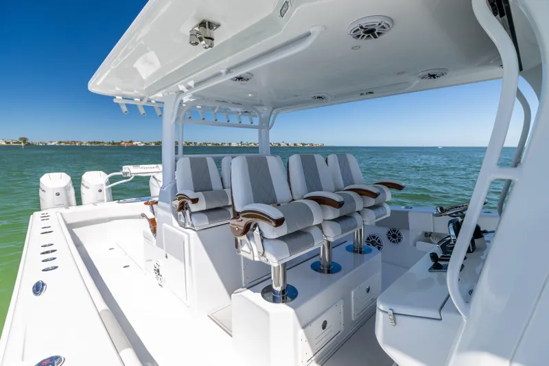 Slide: The Image of 2023 Freeman 43 boat interior with luxury seating on open water. - 43