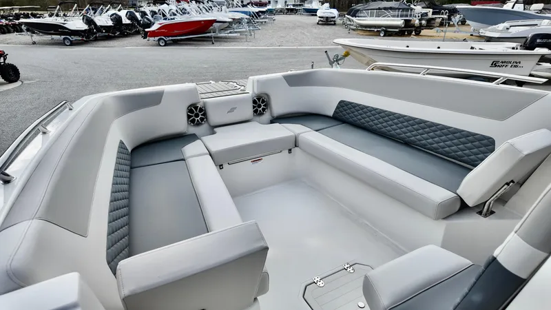 Slide: The Image of 2025 Starcraft SVX 231 OB CC boat interior with spacious seating and modern design. - 12