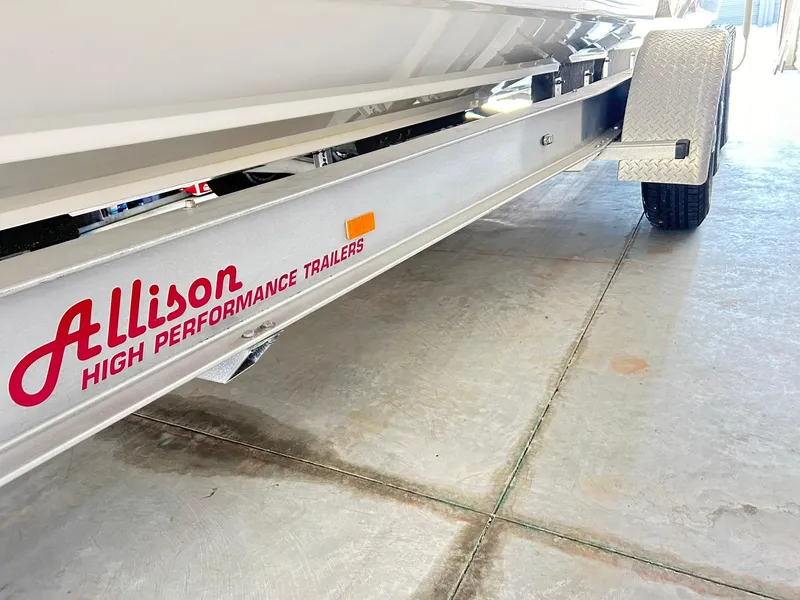 Slide: The Image of Allison high performance trailer under a 2005 Fountain 42 Executioner boat. - 13