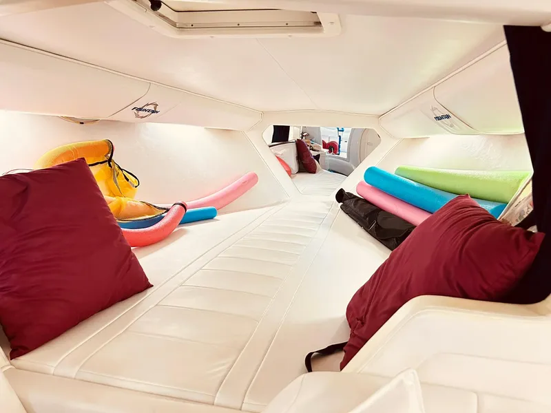 Slide: The Image of Interior of 2005 Fountain 42 Executioner boat with cushions and pool noodles. - 15