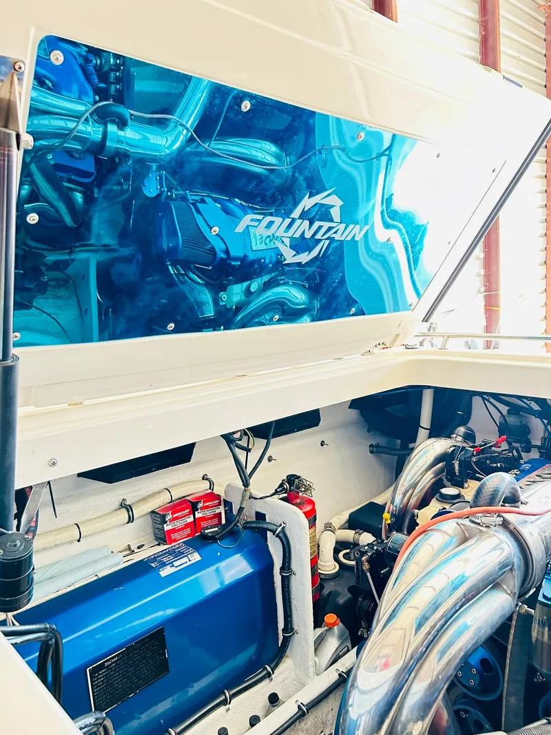 Slide: The Image of 2005 Fountain 42 Executioner engine compartment with blue accents and visible components. - 39