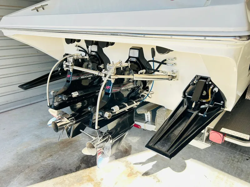 Slide: The Image of Rear view of a 2005 Fountain 42 Executioner boat showing dual outboard motors. - 9