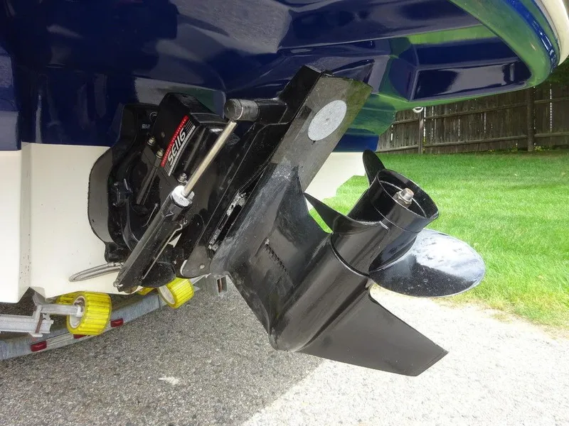 Slide: The Image of 2004 Sea Ray 220 Sundeck boat propeller and outdrive on trailer. - 21