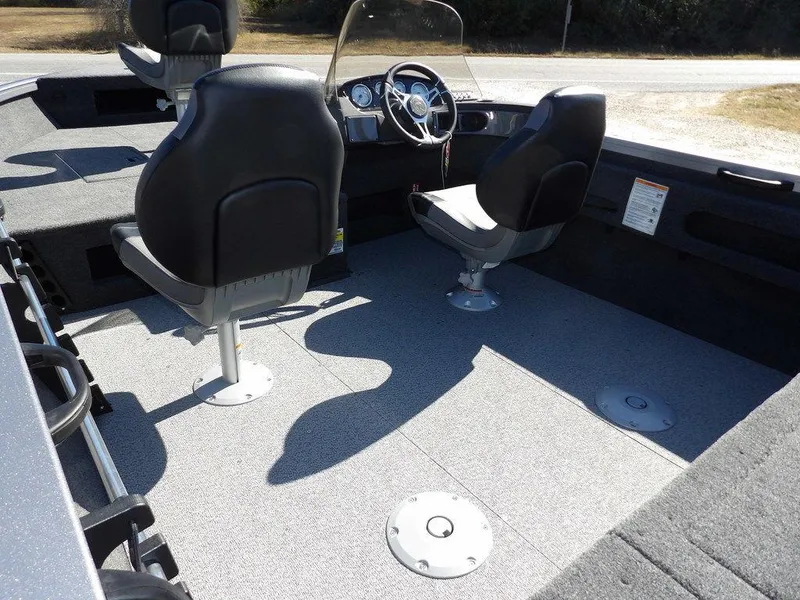 Slide: The Image of Open storage compartment in 2025 Crestliner 1750 Fish Hawk SC boat. - 10