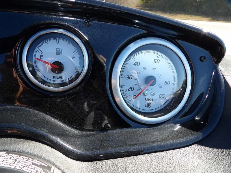 Slide: The Image of 2025 Crestliner 1750 Fish Hawk SC interior with seating and storage compartments. - 23