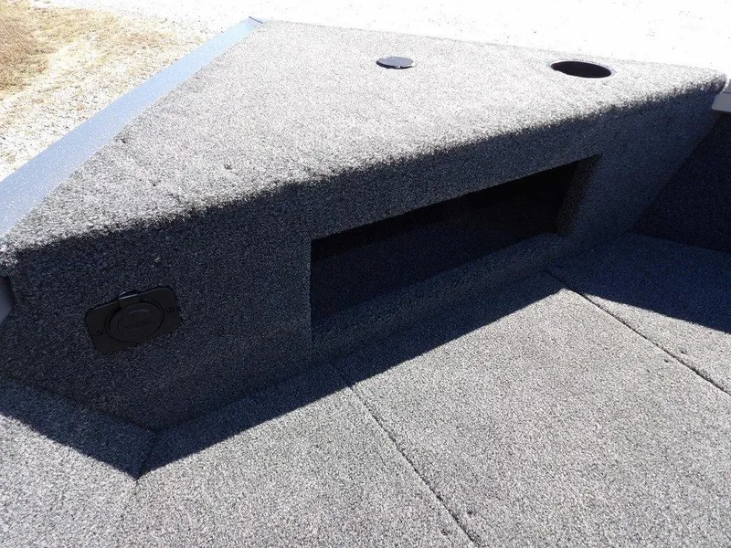 Slide: The Image of 2025 Crestliner 1750 Fish Hawk SC boat interior with seating and carpeted deck. - 37