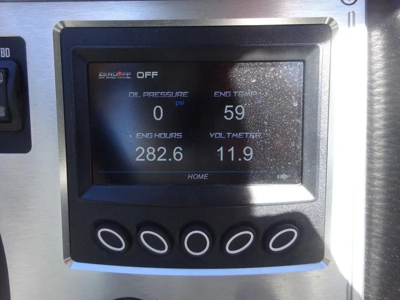 Slide: The Image of Dashboard display of a 2019 MasterCraft NXT20 showing engine metrics and settings. - 19