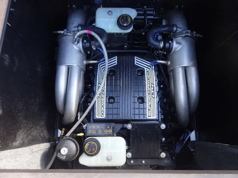 Slide: The Image of 2020 Malibu M240 engine compartment with supercharged V8 engine and dual exhaust system. - 20