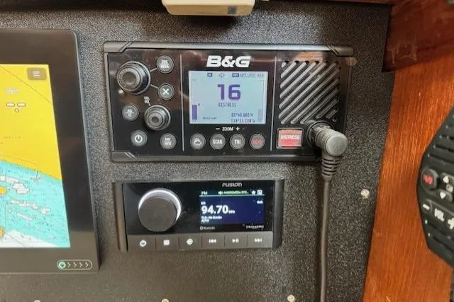 Slide: The Image of 1979 CAL 39 MK II Tall Rig yacht bathroom with sink, toilet, and wooden cabinetry. - 25