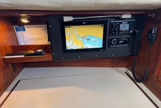 Slide: The Image of 1979 CAL 39 MK II Tall Rig plumbing system with control panel and hoses. - 26