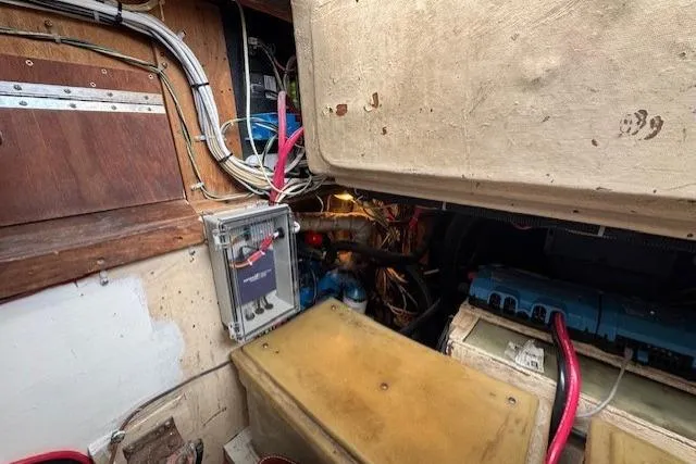 Slide: The Image of Blue electrical inverter installed on a 1979 CAL 39 MK II TALL RIG sailboat. - 47