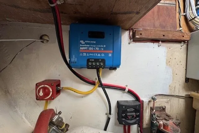 Slide: The Image of Electrical wiring and components inside a 1979 CAL 39 MK II Tall Rig sailboat. - 48