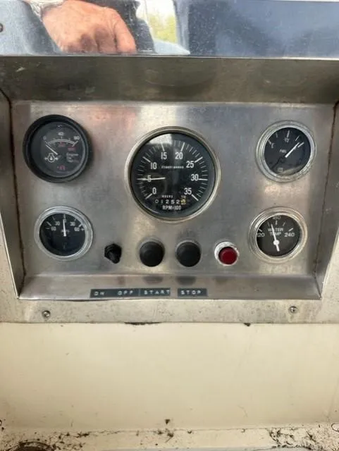 Slide: The Image of Engine compartment of a 1979 CAL 39 MK II Tall Rig sailboat, showing wiring and components. - 50