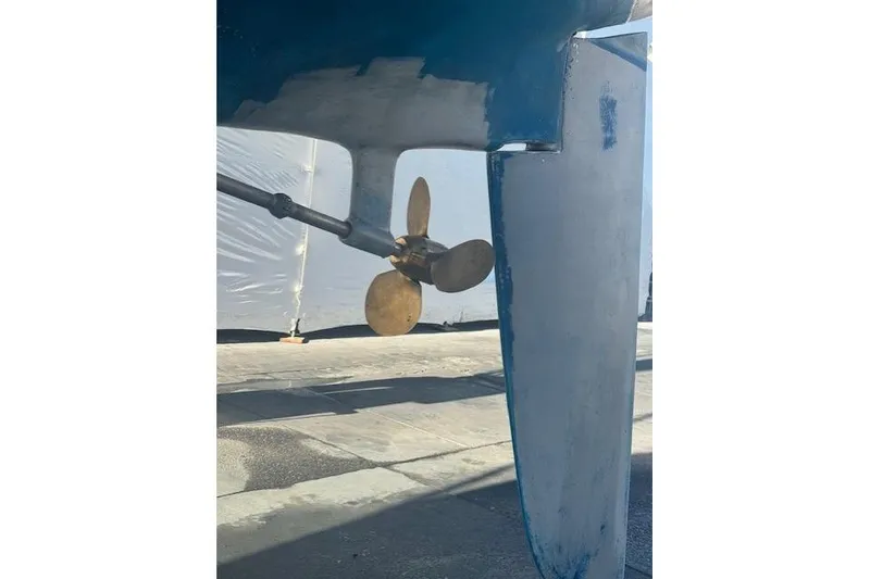 Slide: The Image of 1979 CAL 39 MK II Tall Rig sailboat on stands in a boatyard. - 59