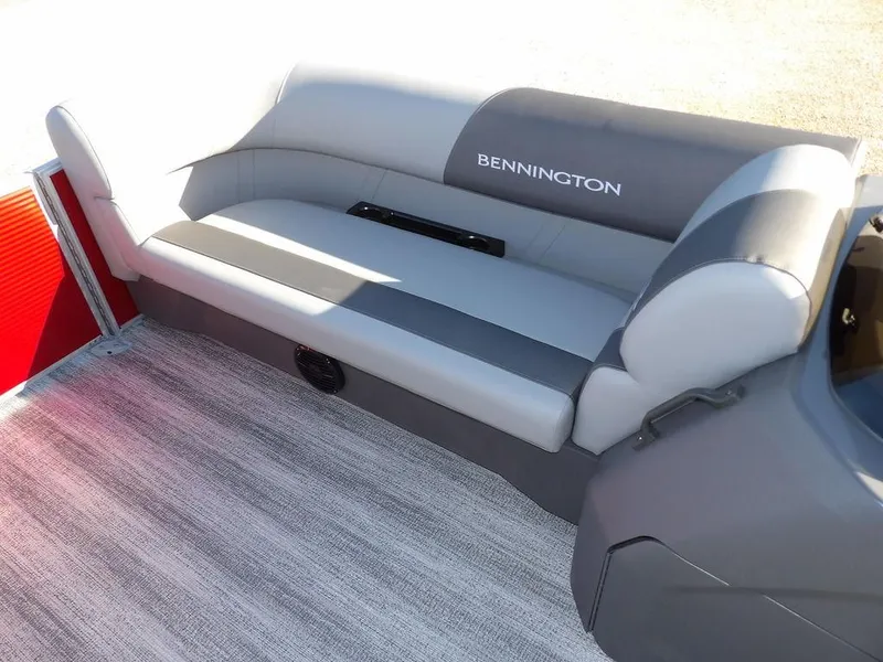 Slide: The Image of 2025 Bennington 21 SLJ boat interior with gray seating and carpet flooring. - 12