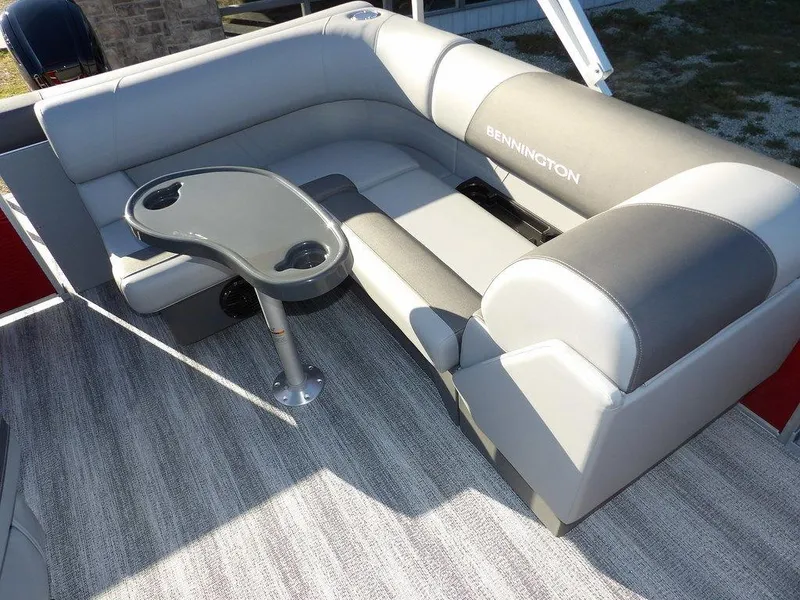Slide: The Image of 2025 Bennington 21 SLJ boat interior with gray seating and table. - 15