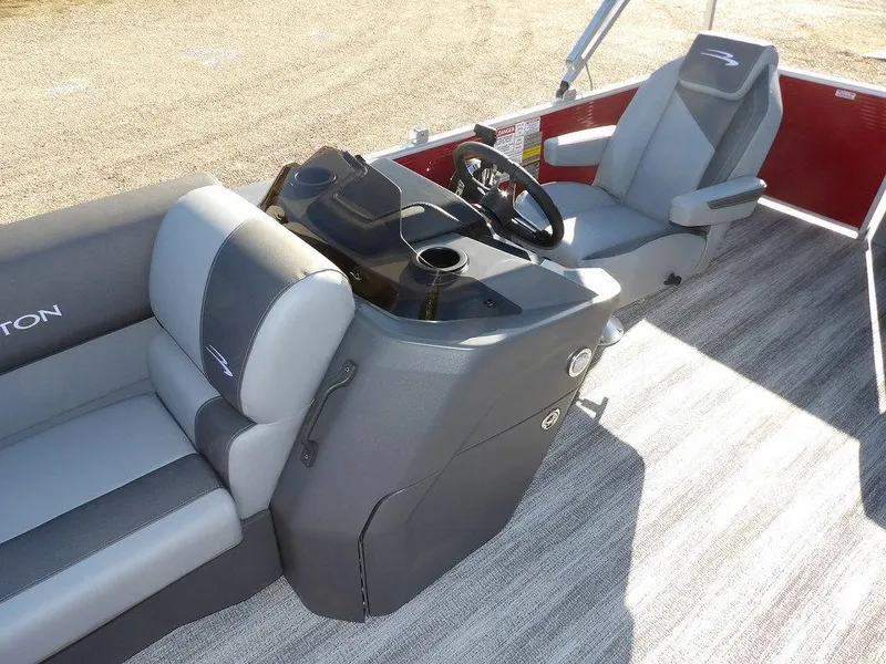 Slide: The Image of 2025 Bennington 21 SLJ boat interior with modern seating and steering console. - 16