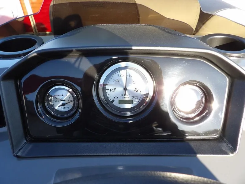 Slide: The Image of Dashboard of 2025 Bennington 21 SLJ boat with RPM gauges. - 19