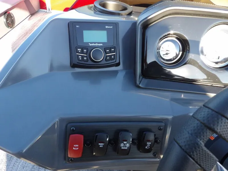 Slide: The Image of Dashboard of 2025 Bennington 21 SLJ boat with controls and stereo system. - 20
