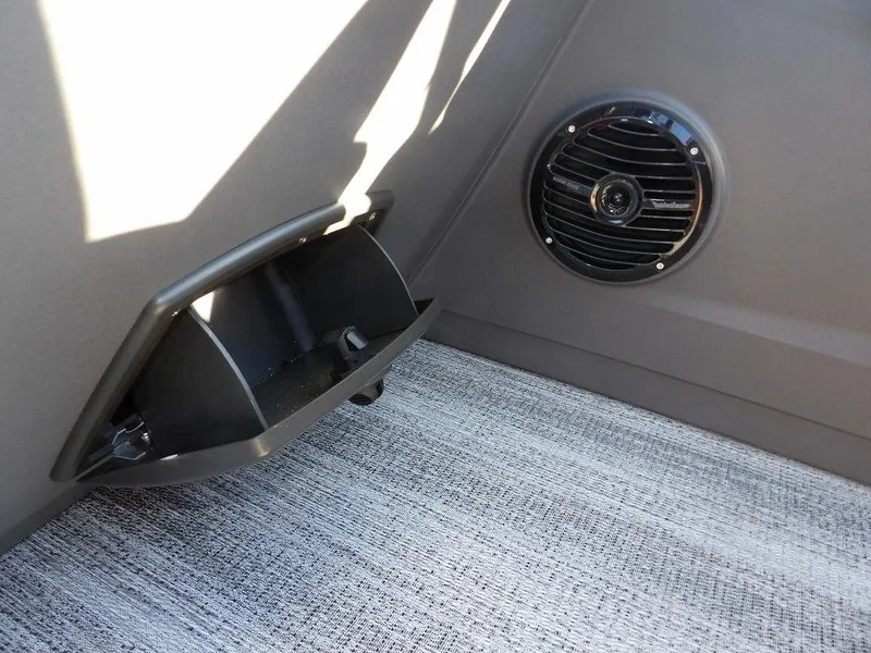 Slide: The Image of 2025 Bennington 21 SLJ interior with speaker and storage compartment. - 29