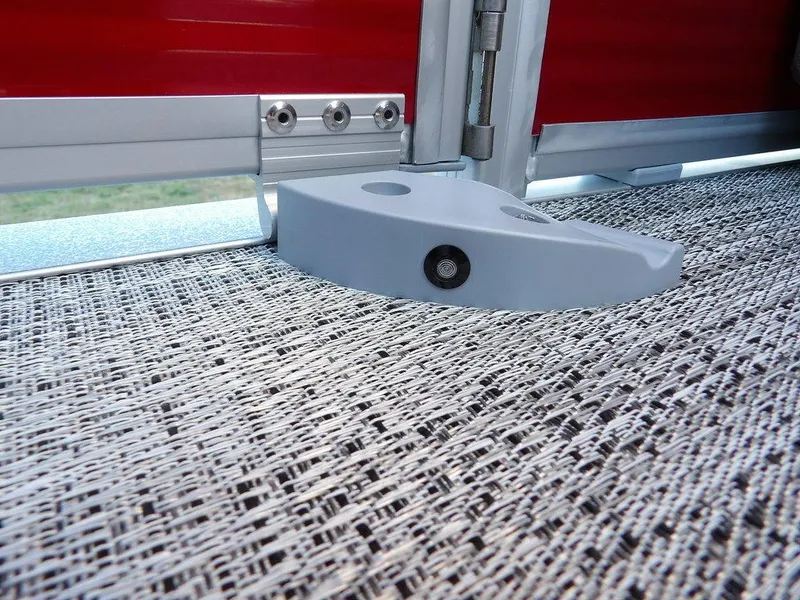 Slide: The Image of Close-up of 2025 Bennington 21 SLJ boat interior detail with textured flooring. - 31