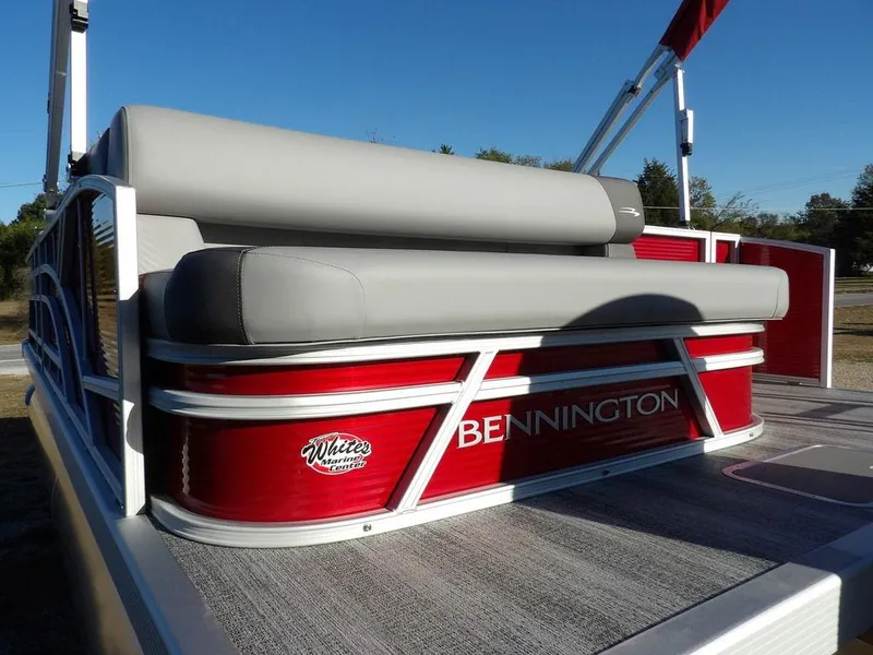 Slide: The Image of 2025 Bennington 21 SLJ pontoon boat with red and gray seating. - 42