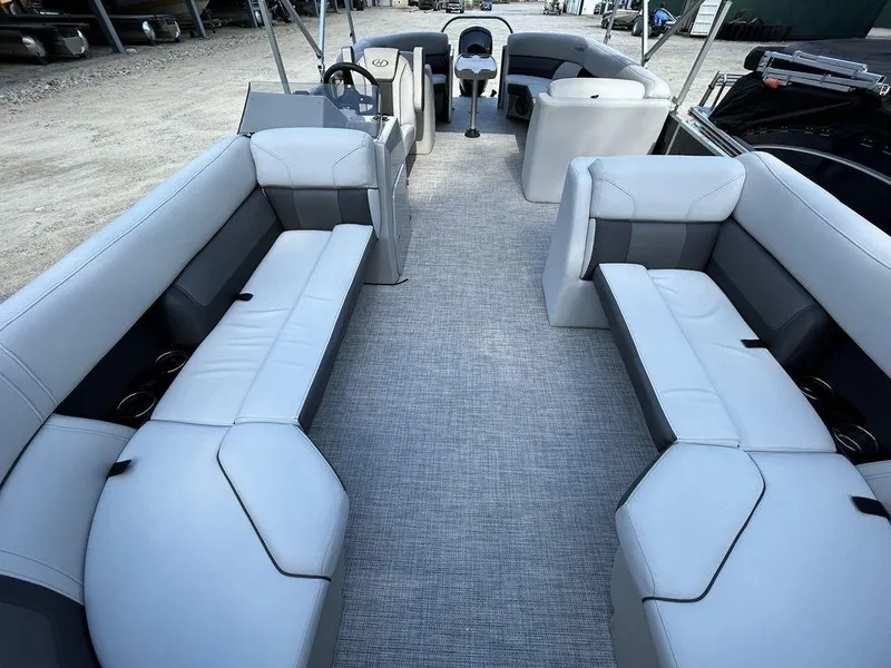 Slide: The Image of 2022 Harris Cruiser 230 interior with spacious seating and modern design. - 7