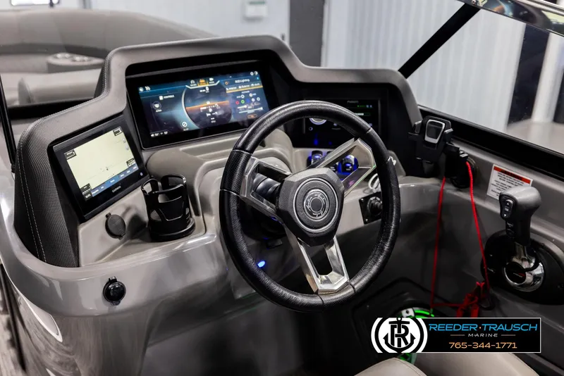 Slide: The Image of 2022 Avalon Waketoon dashboard with steering wheel and digital displays. - 12