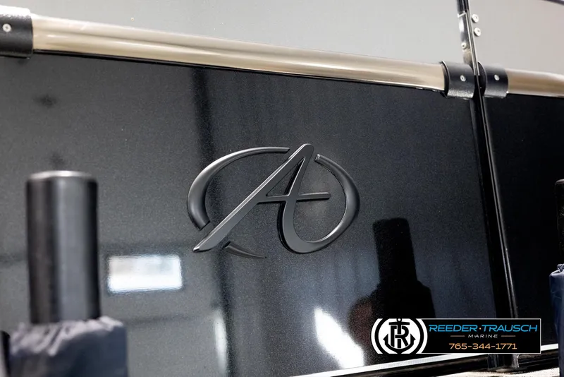 Slide: The Image of 2022 Avalon Waketoon logo on sleek black surface, featuring Reeder-Trausch Marine branding. - 22