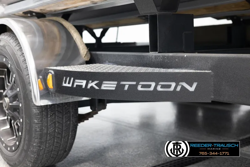 Slide: The Image of Trailer with Avalon Waketoon branding, 2022 model, featuring a sturdy wheel and step. - 23