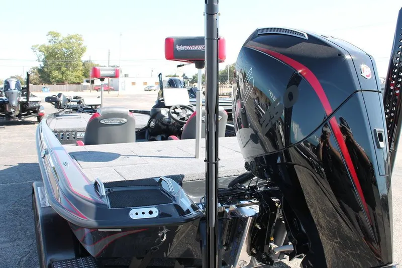 Slide: The Image of 2025 Phoenix 721 ZXL boat with powerful engine, sleek design, and modern features. - 5