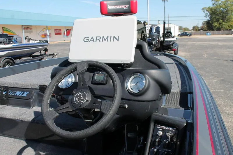 Slide: The Image of 2025 Phoenix 721 ZXL boat dashboard with Garmin navigation system. - 6
