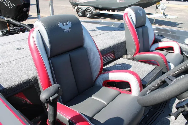 Slide: The Image of 2025 Phoenix 721 ZXL boat seats with red and gray upholstery, featuring a sleek design. - 7