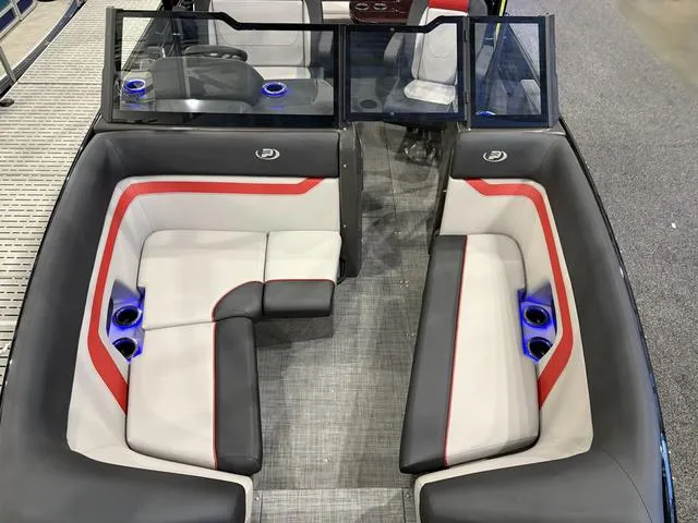 Slide: The Image of 2025 Princecraft Ventura 230 Wake Board Deck Boat interior with stylish seating and cup holders. - 14