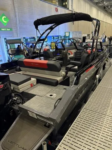 Slide: The Image of 2025 Princecraft Ventura 230 WRL dashboard with modern controls and steering wheel. - 4