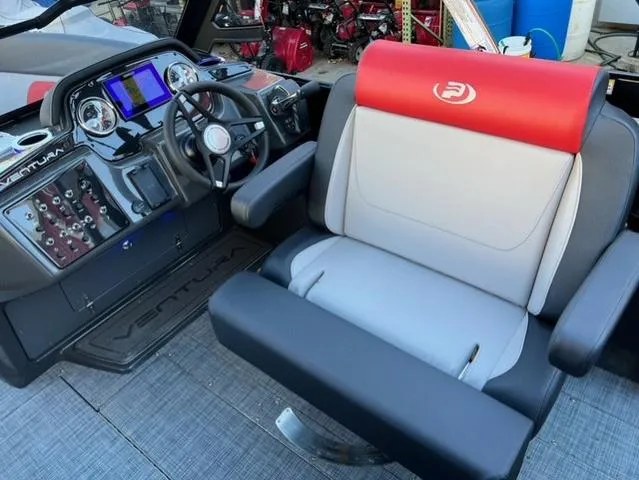 Slide: The Image of 2025 Princecraft Ventura 230 boat interior with modern dashboard and comfortable seating. - 9