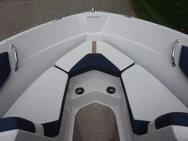 Slide: The Image of 2013 Four Winns Horizon 200 boat interior with cushioned seating. - 15