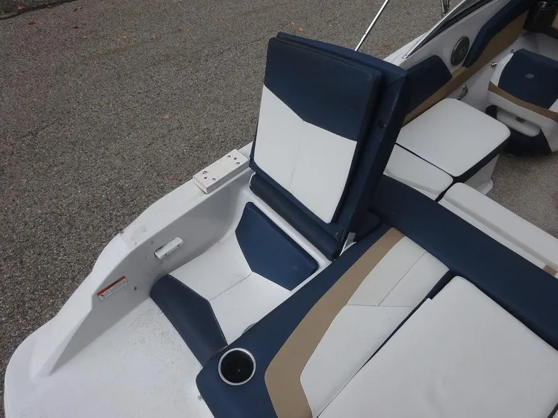 Slide: The Image of 2013 Four Winns Horizon 200 boat interior with blue and white seating. - 18