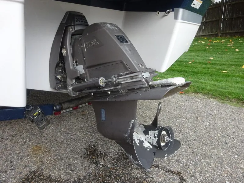 Slide: The Image of 2013 Four Winns Horizon 200 boat outboard motor on pavement. - 20