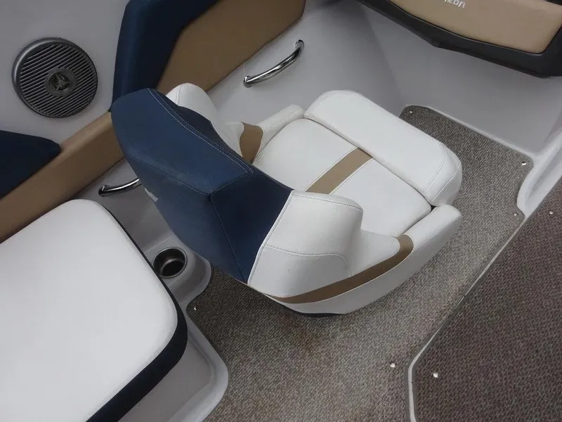 Slide: The Image of 2013 Four Winns Horizon 200 boat interior with cushioned seating and carpeted flooring. - 8