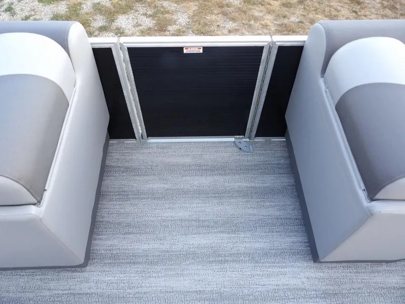 Slide: The Image of 2025 Bennington 21 SL pontoon boat interior with gray seating and flooring. - 17