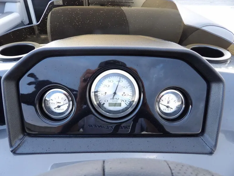 Slide: The Image of Dashboard of 2025 Bennington 21 SL boat with gauges and controls. - 23