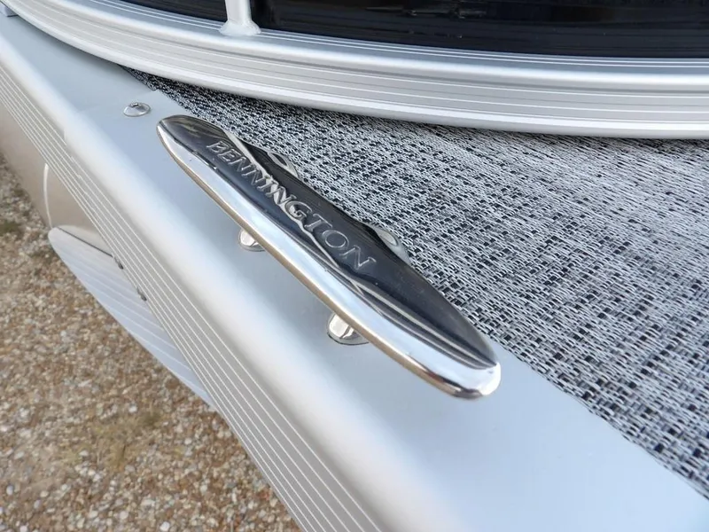 Slide: The Image of 2025 Bennington 21 SL boat cleat on textured deck surface. - 37