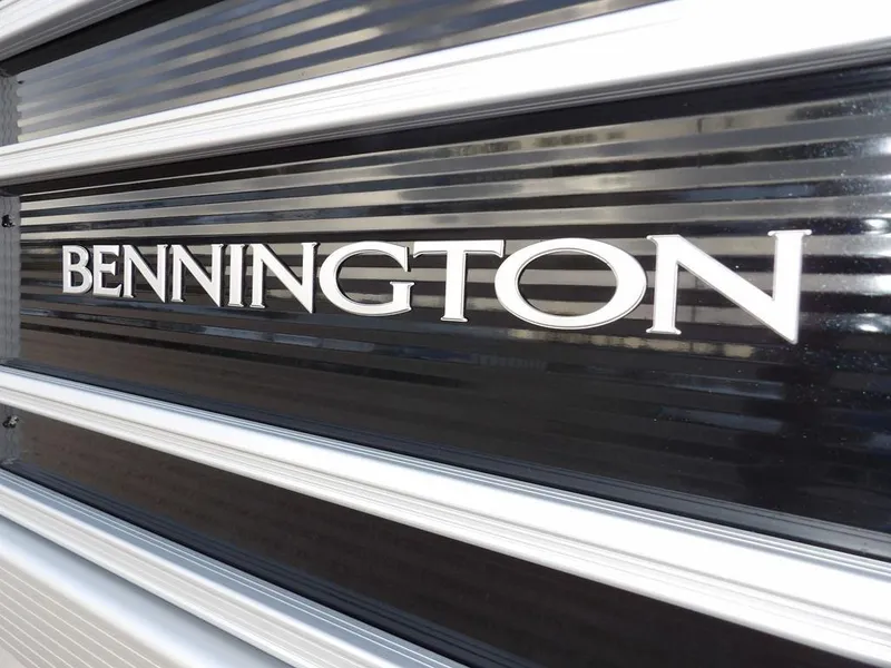 Slide: The Image of 2025 Bennington 21 SL logo on sleek black surface. - 39